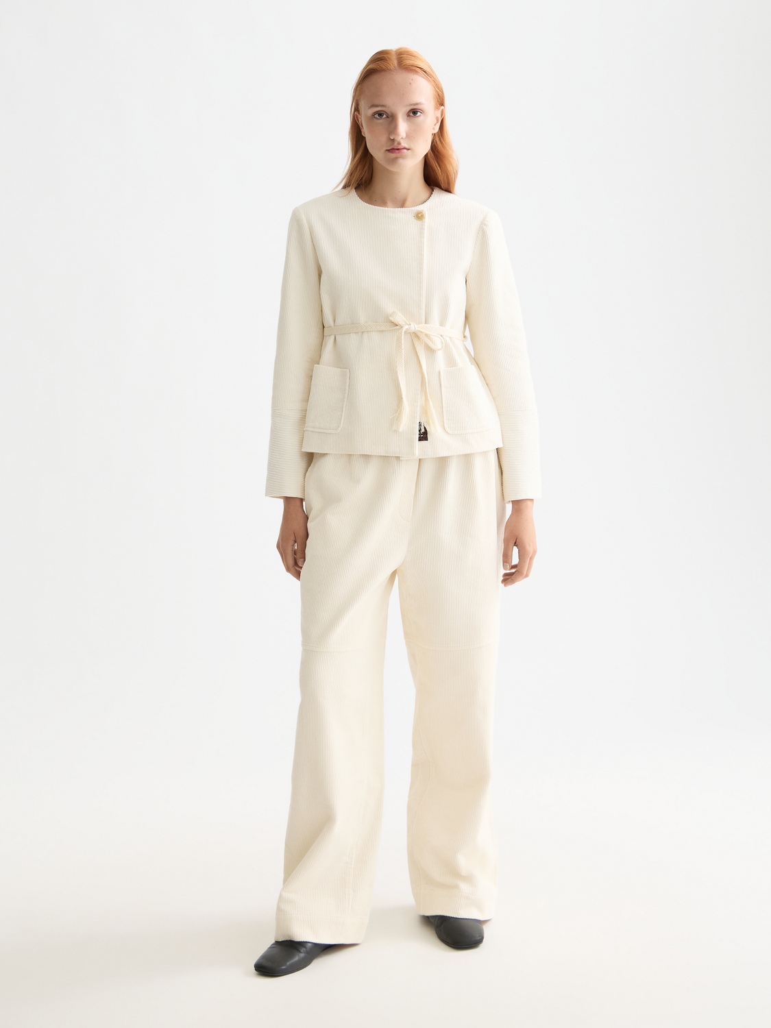 Scarlet beltless collarless blazer by Scotch & Soda featuring a sleek, tailored fit and minimalistic design.