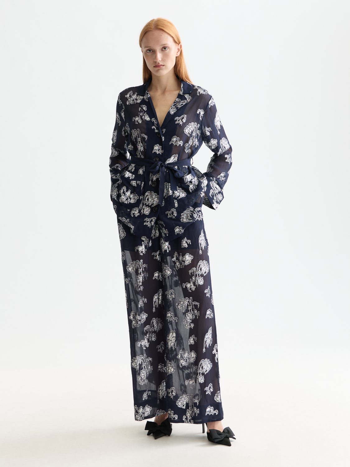 Scotch & Soda pyjama blazer with tailored fit, navy color, and classic lapel, shown on a model.