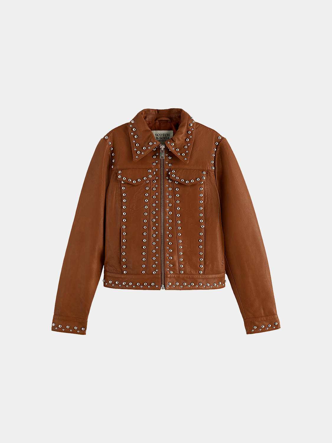 Leather trucker jacket by Scotch & Soda, featuring classic design, chest pockets, and button closure, displayed on a hanger.