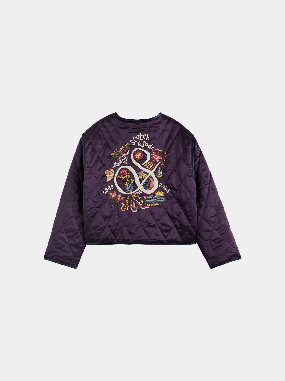 Reversible souvenir jacket by Scotch & Soda, showing both patterned and solid sides, with a classic collar and button closure.