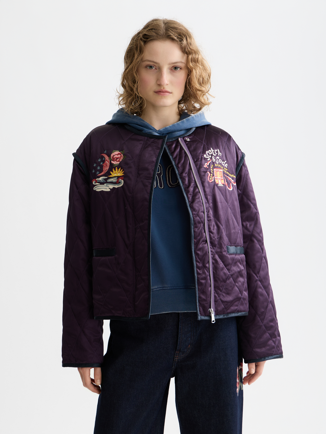 Reversible souvenir jacket by Scotch & Soda showing two different stylish sides with vibrant patterns and casual fit.