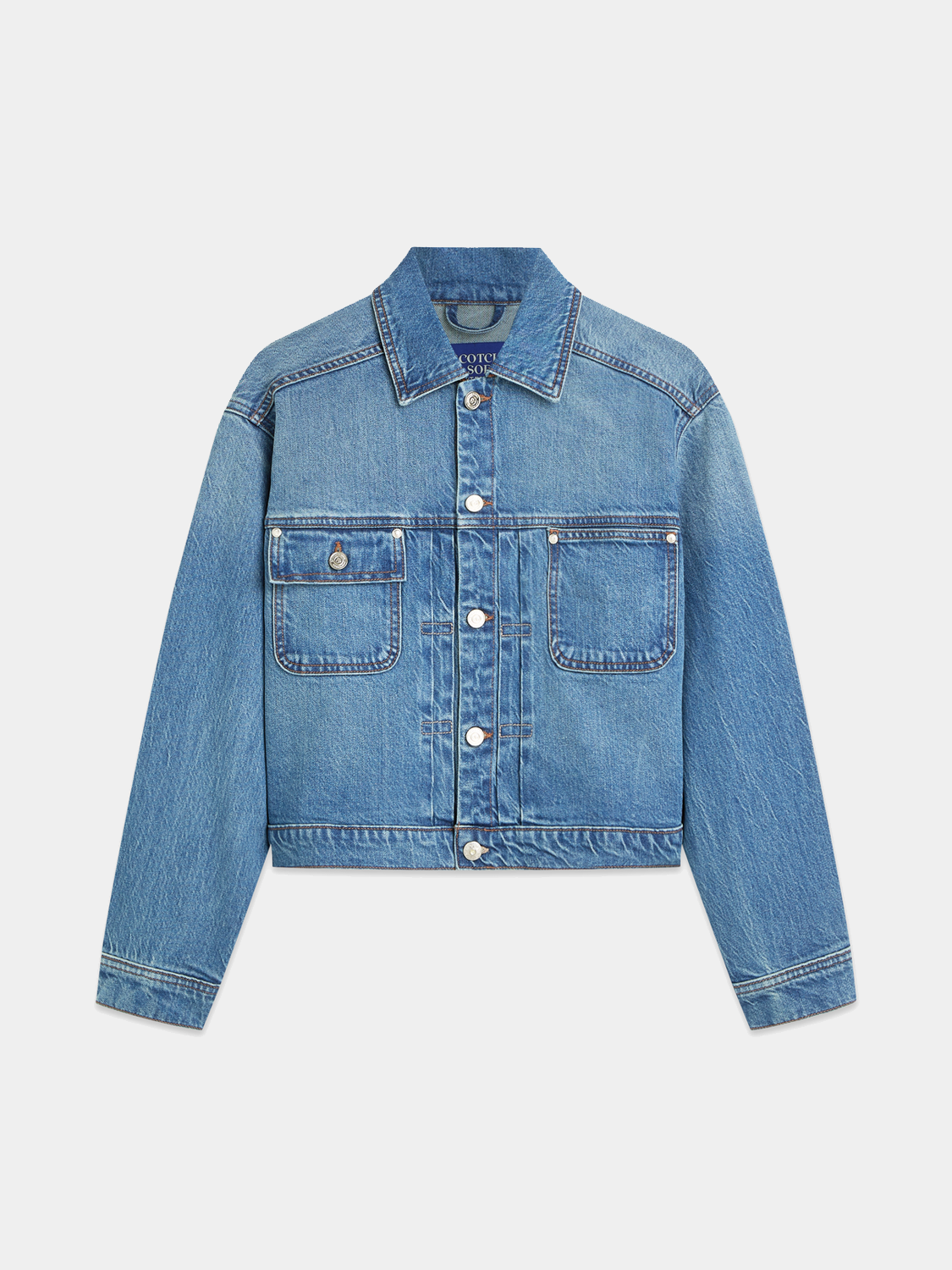Scotch & Soda denim trucker jacket with button front and classic collar, styled with chest pockets and rolled sleeves.