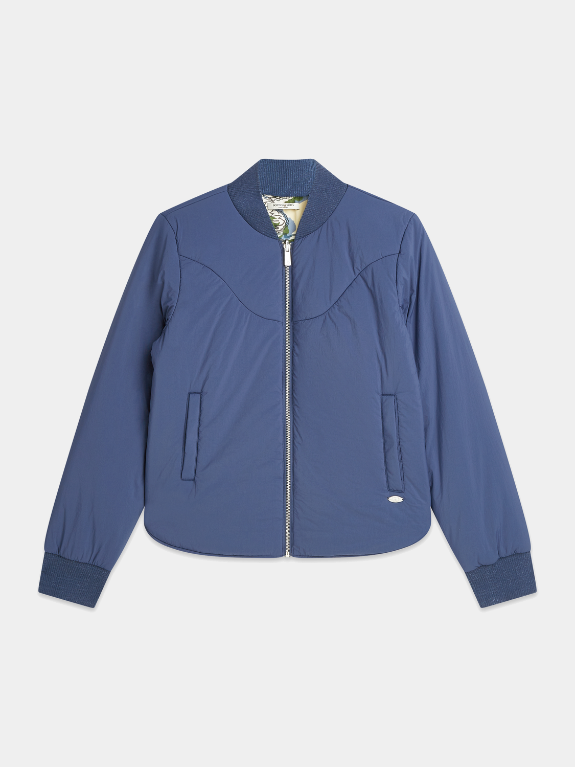 Reversible Scotch & Soda bomber jacket with black and patterned sides, casual style, shown hanging on a wooden hanger.