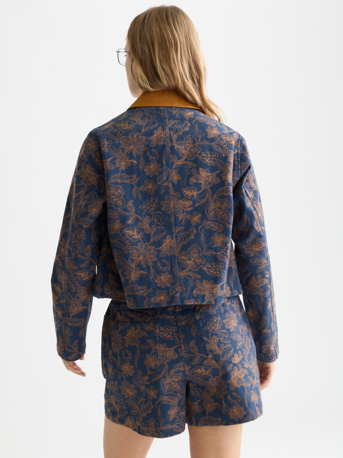 Embroidered Scotch & Soda jacket with floral patterns and detailed stitching, shown from the back.