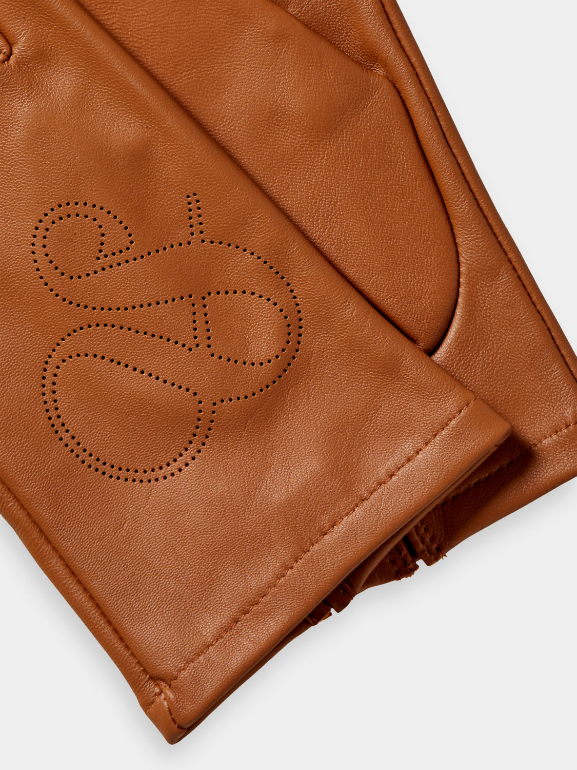 Perforated leather gloves by Scotch & Soda showing detailed stitching and breathable design on a neutral background.