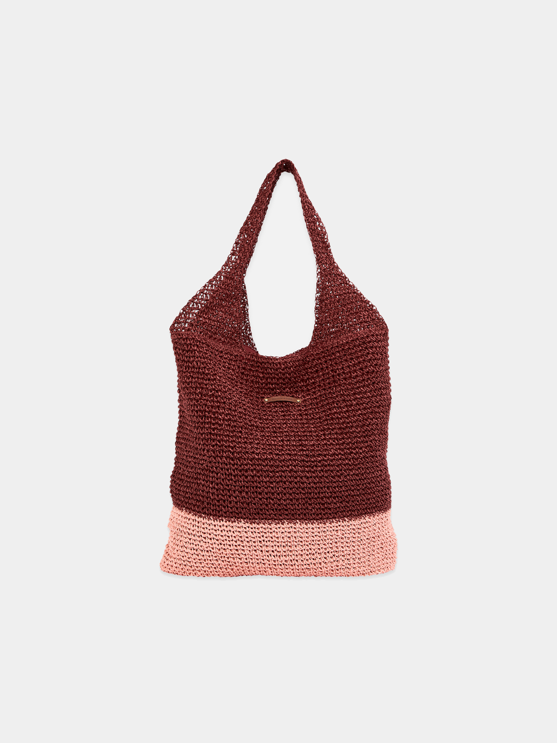 Oversized straw bag by Scotch & Soda with leather handles and woven texture, perfect for casual summer outings.