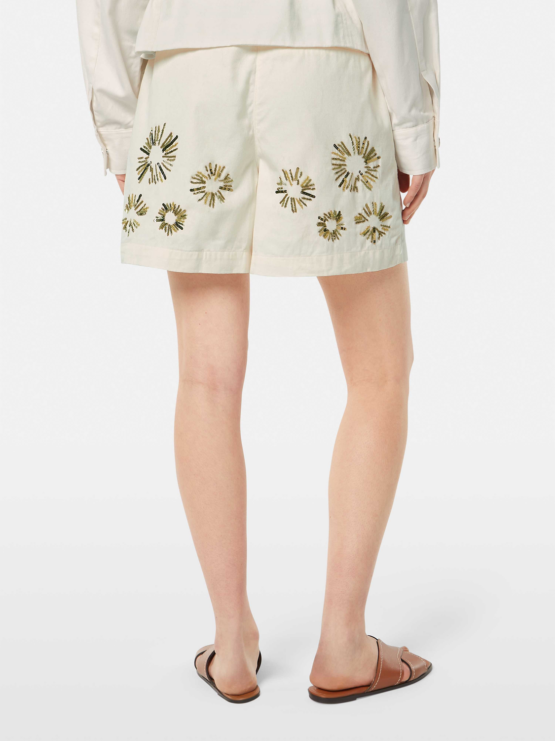 Embroidered shorts by Scotch & Soda featuring detailed stitching, casual fit, and a back view showing intricate embroidery.