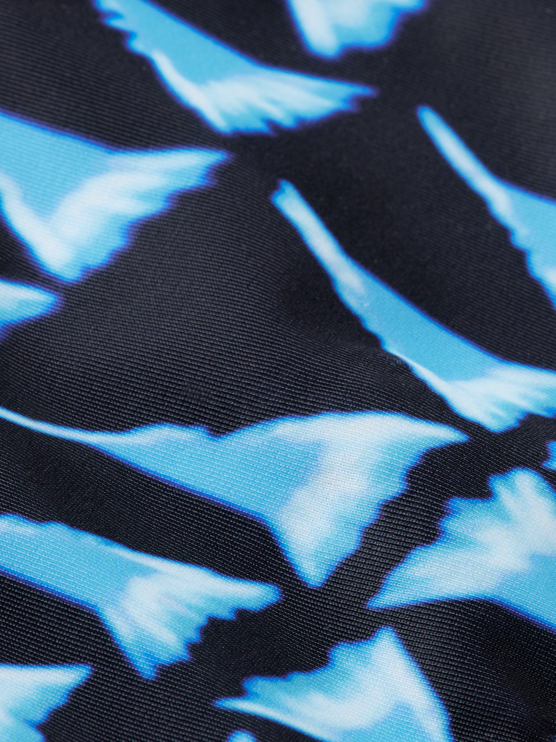 Printed SCOTCH & SODA bikini top for swimwear, featuring vibrant pattern and adjustable straps on a flat-lay background.