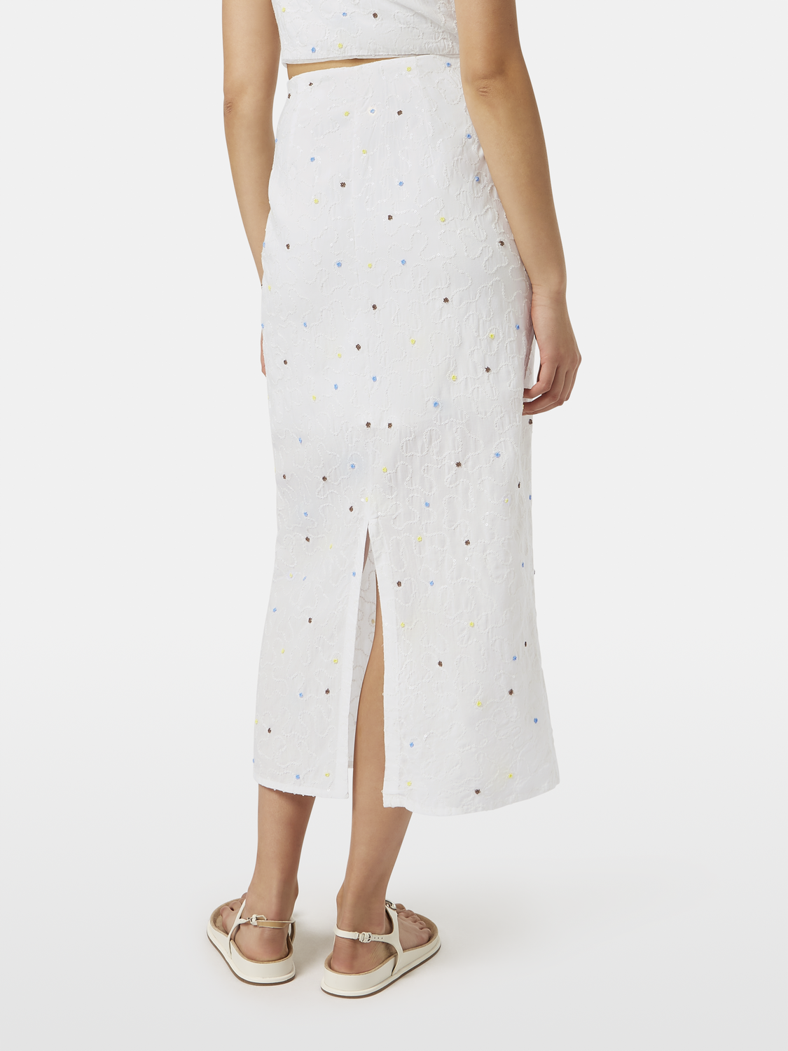 Beaded midi skirt by Scotch & Soda featuring intricate beadwork, flowing fabric, and a stylish mid-length design.