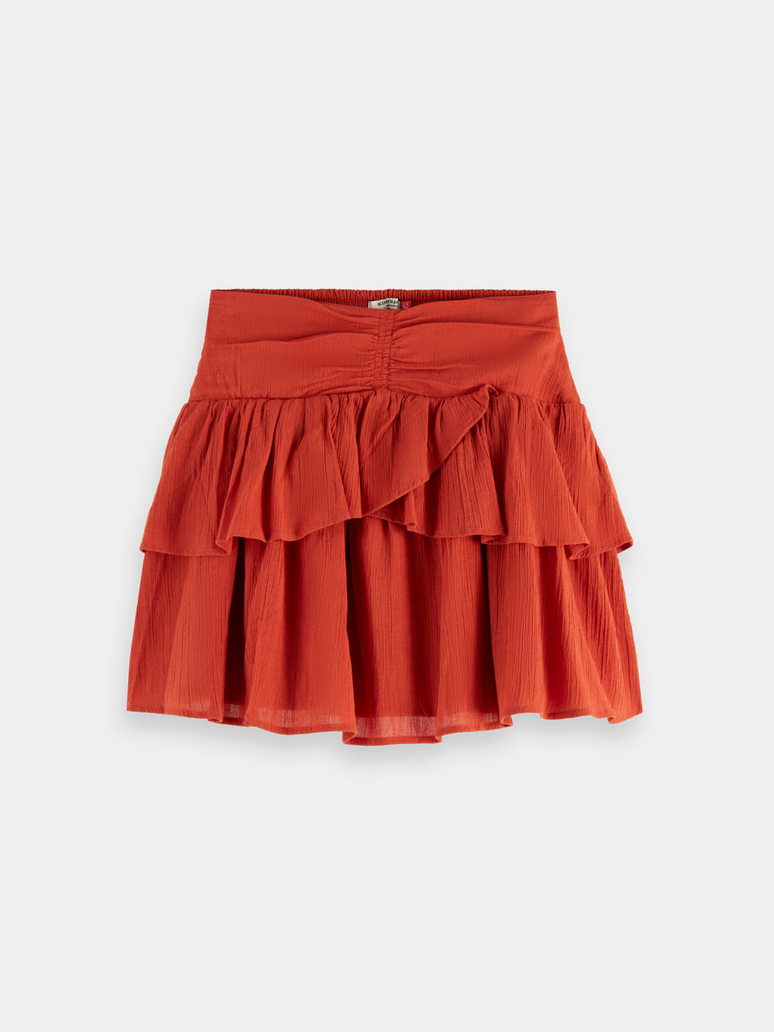 Smocked mini skirt by Scotch & Soda featuring a fitted waist and lightweight fabric, displayed on a neutral background.