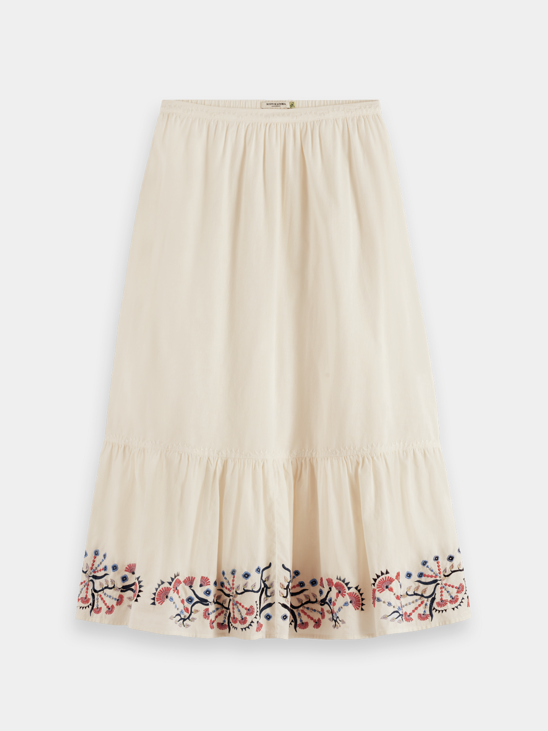 Embroidered maxi skirt by Scotch & Soda with floral patterns and flowing fabric, displayed on a neutral background.