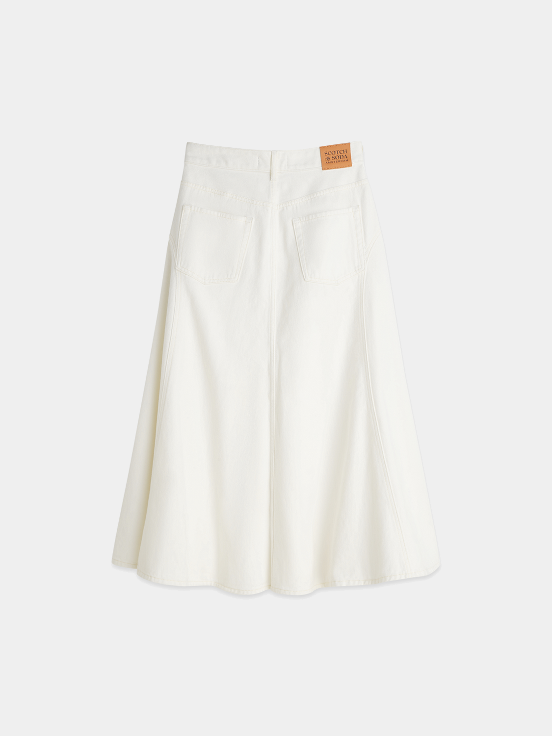 Dark blue denim maxi skirt by Scotch & Soda with a flowing silhouette and high waist, displayed hanging on a wooden background.