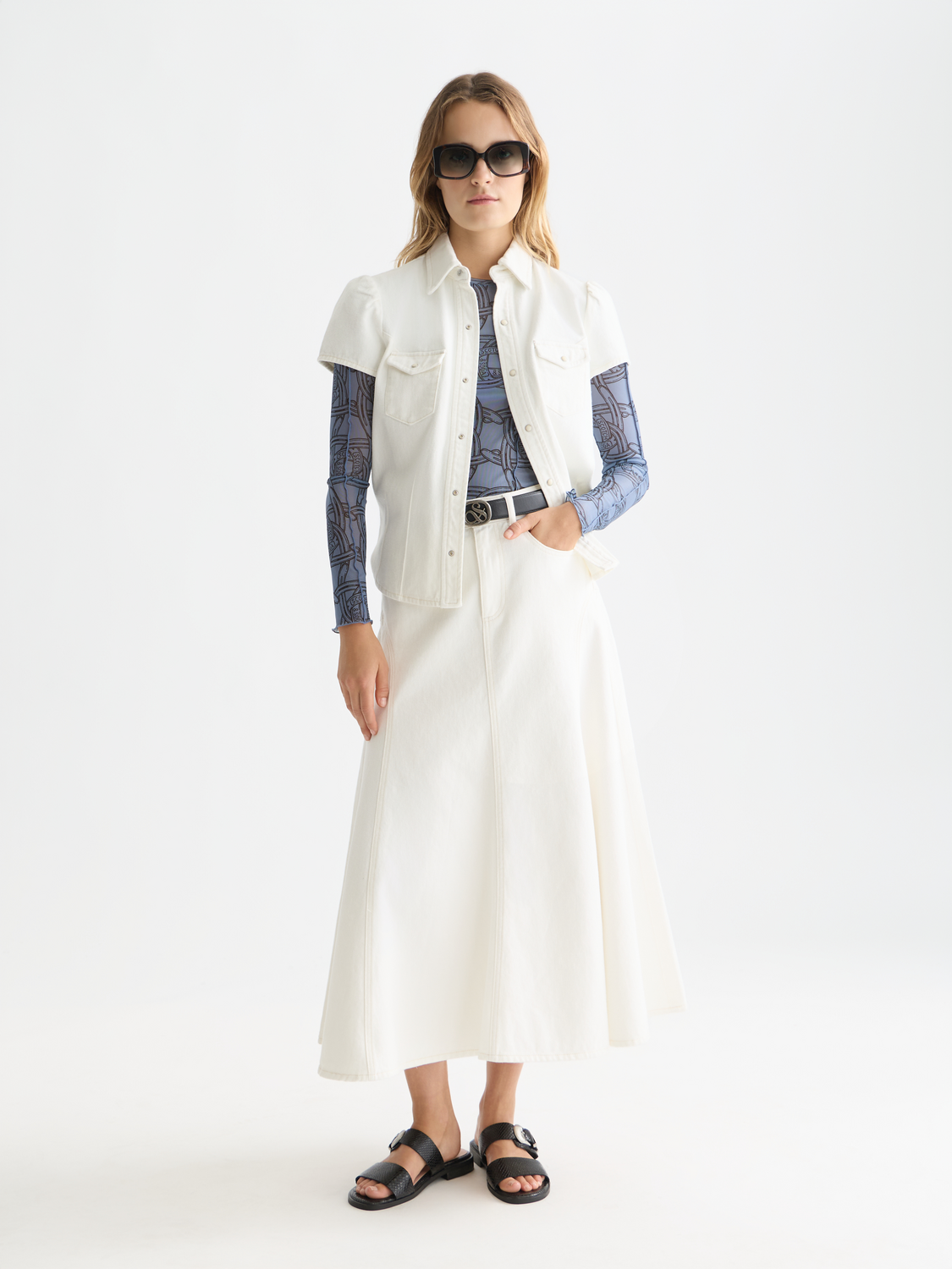 Denim maxi skirt from Scotch & Soda with a high waist and flowing length, featuring classic blue denim fabric.