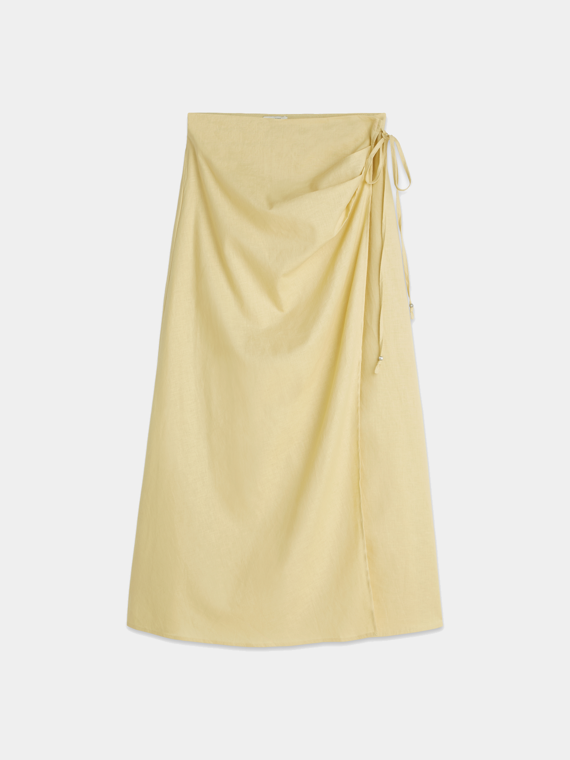 Light beige linen wrap skirt from Scotch & Soda with a tied waist and knee-length design, perfect for casual and summer outfits.