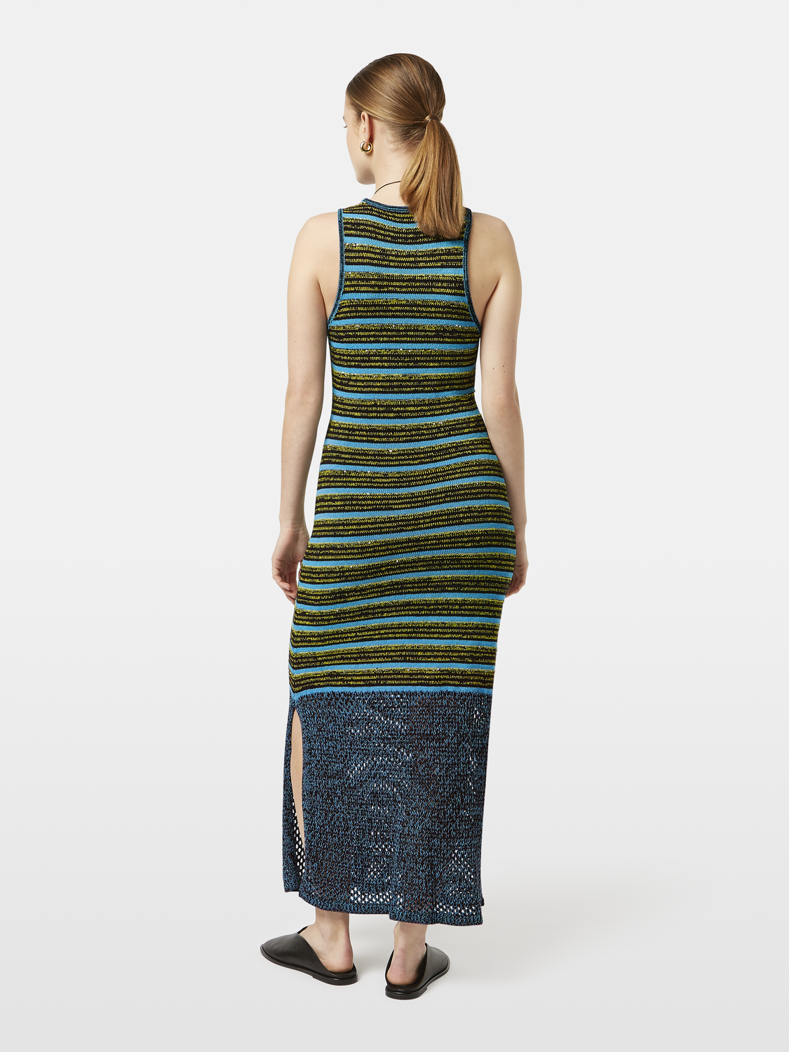 Striped knitted dress by SCOTCH & SODA featuring a fitted silhouette and colorful horizontal stripes, displayed on a mannequin.