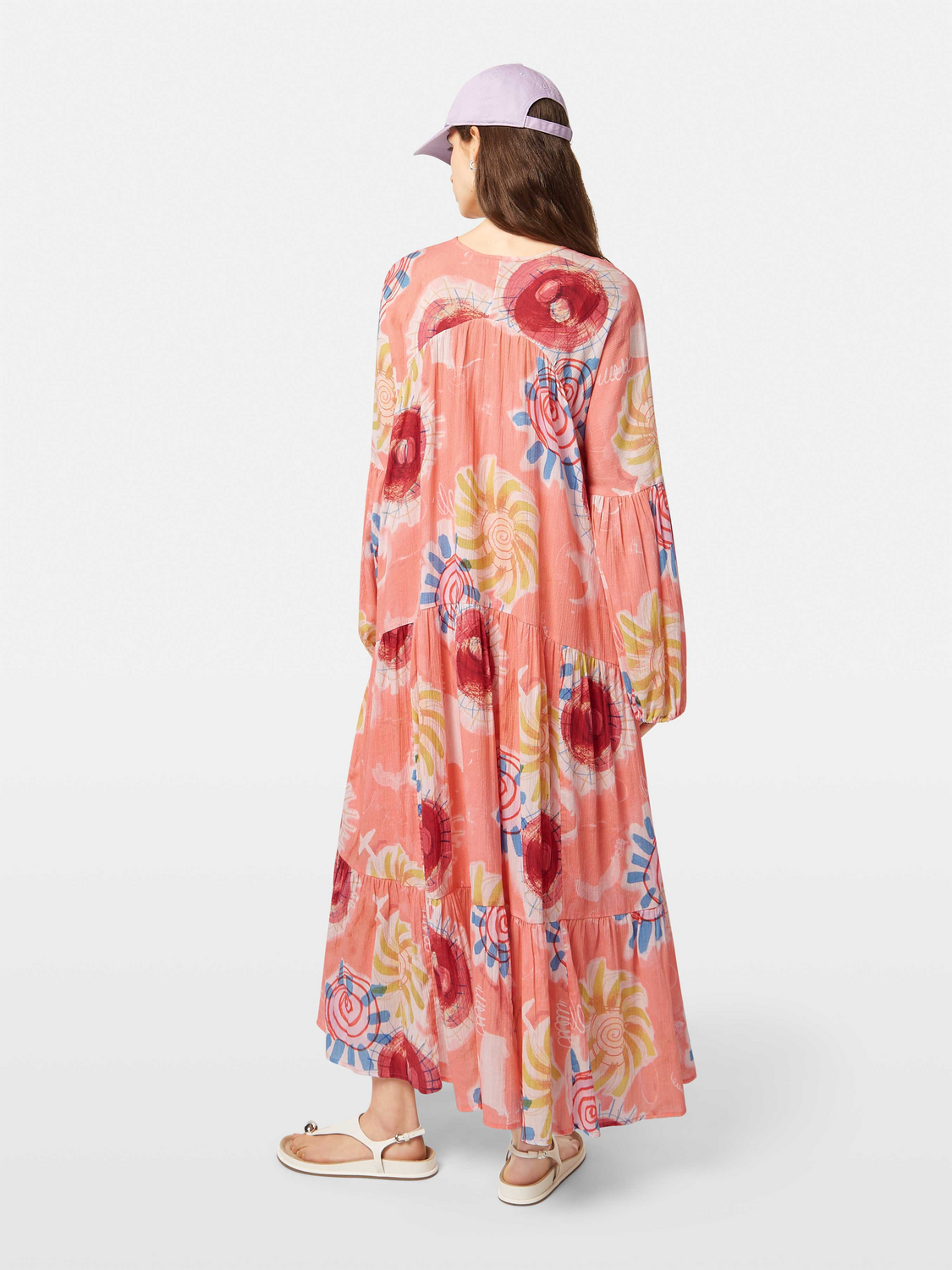 Scotch & Soda crinkle maxi dress featuring a flowing silhouette and textured fabric, shown in a back view.