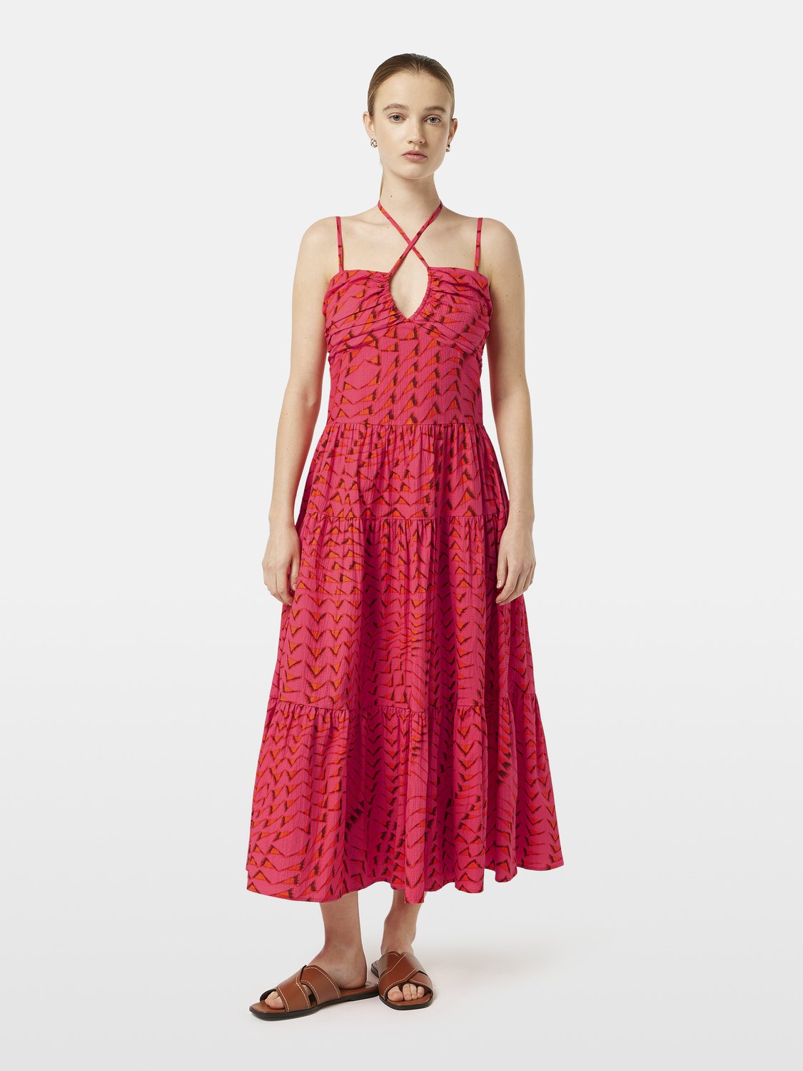 Seersucker midi dress by Scotch & Soda featuring a striped pattern, sleeveless design, and a fitted waist on a model.