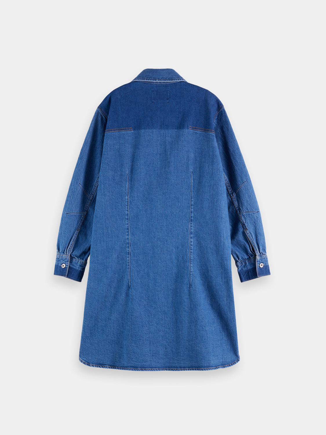 Washed denim mini shirtdress by Scotch & Soda, featuring a button-front design and short sleeves, displayed on a hanger.