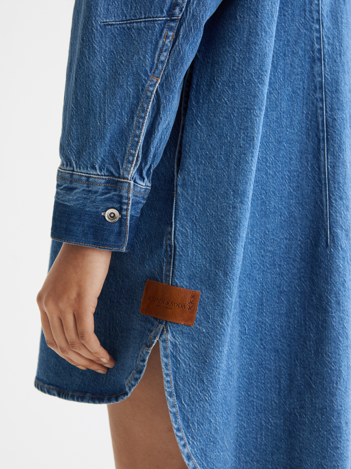 Washed denim mini shirtdress by SCOTCH & SODA featuring a button-down front, collar, and casual fit.