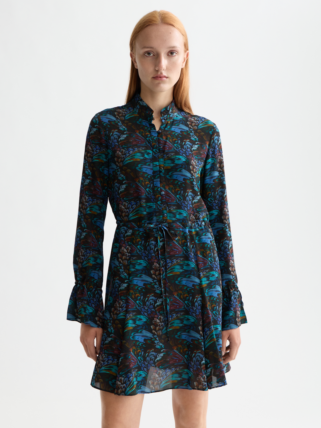 Printed mini dress by Scotch & Soda featuring vibrant floral patterns, sleeveless design, and a fitted silhouette.