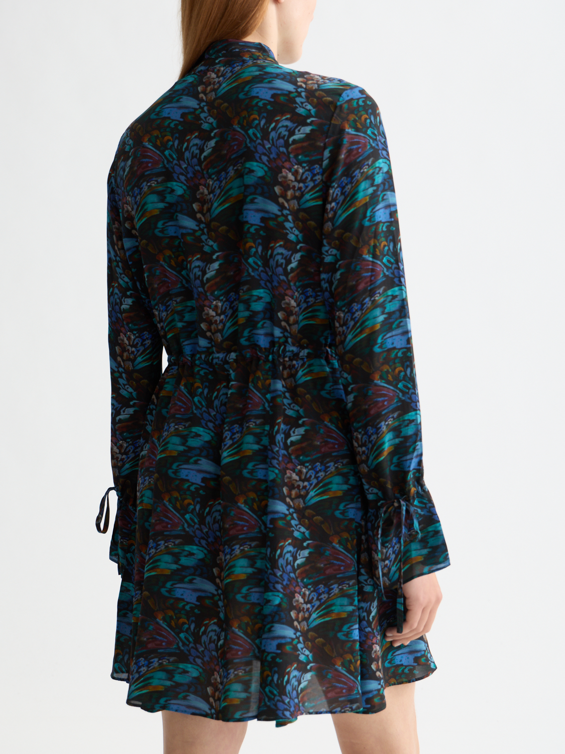 Printed mini dress from SCOTCH & SODA featuring a vibrant floral pattern and a stylish, fitted silhouette.