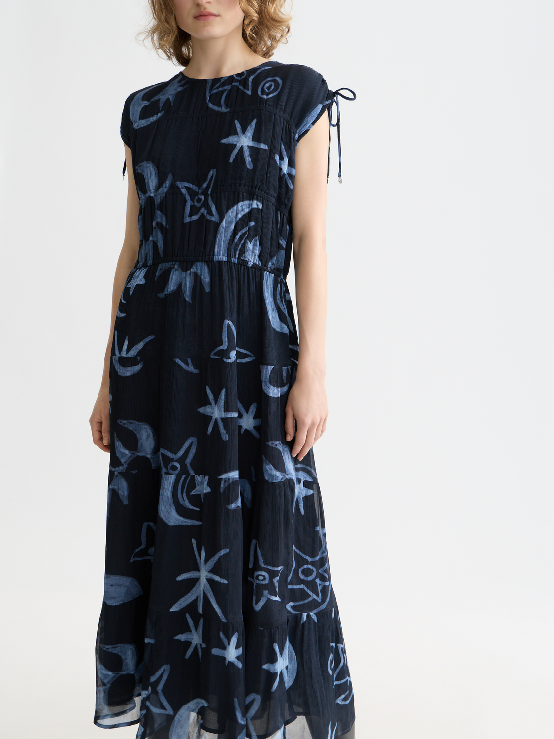 Scotch & Soda gathered midi dress with a flowy silhouette, featuring a fitted waist and stylish pattern in soft fabric.