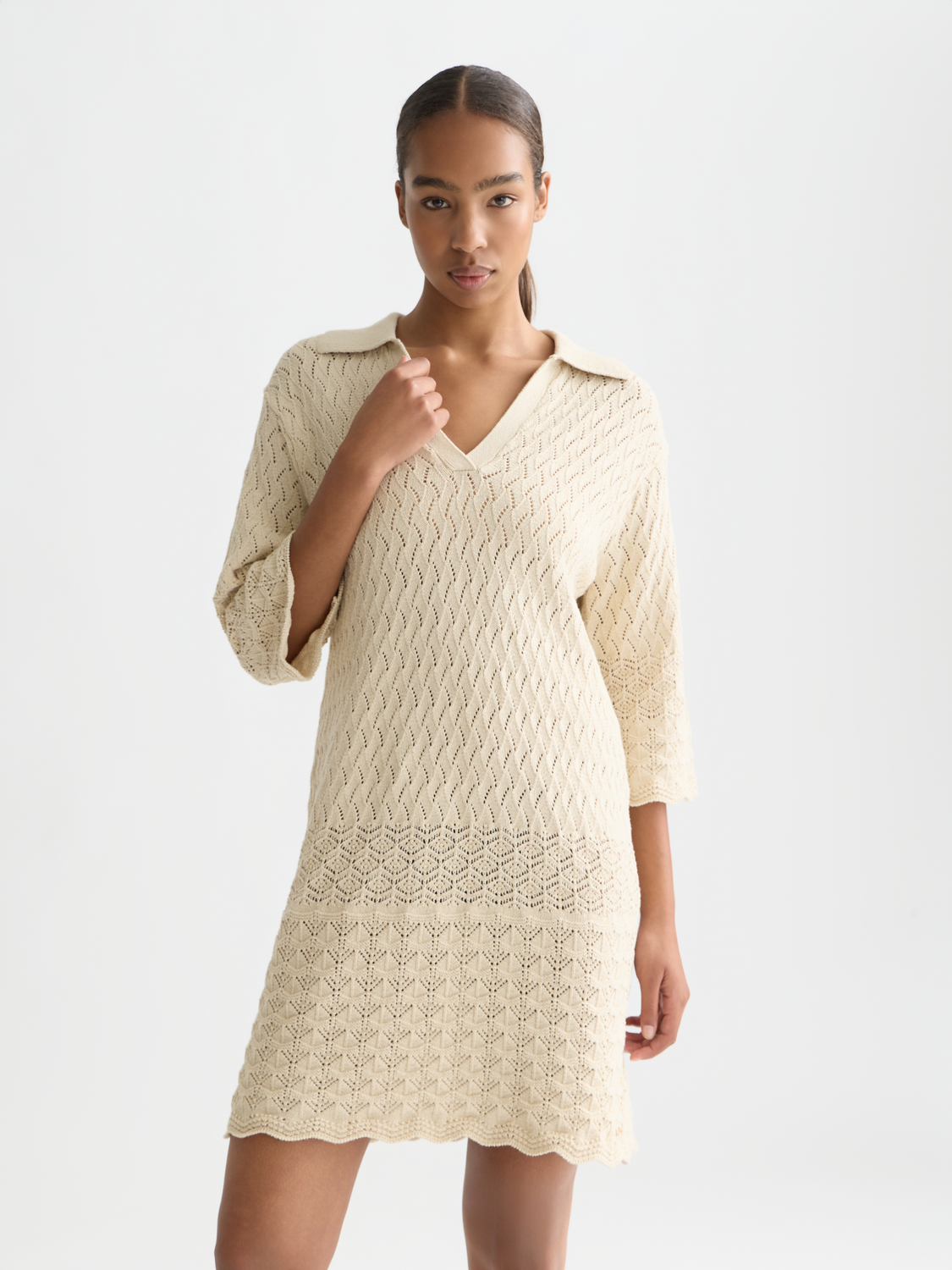 Pointelle knitted tunic dress by Scotch & Soda, featuring a textured pattern and relaxed fit, worn by a model.