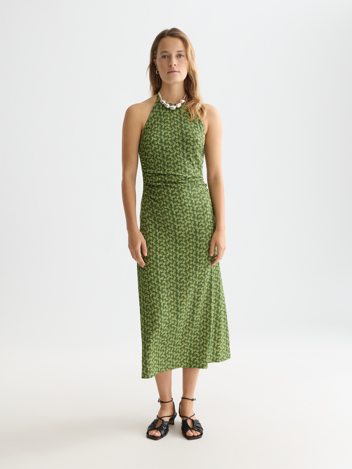 Open back midi dress by Scotch & Soda, featuring a flowy silhouette and stylish design, shown on a model.