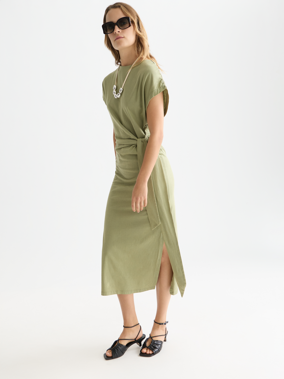 Knotted midi dress by Scotch & Soda featuring a stylish design, with fabric detailing and a flattering fit, shown on a model.