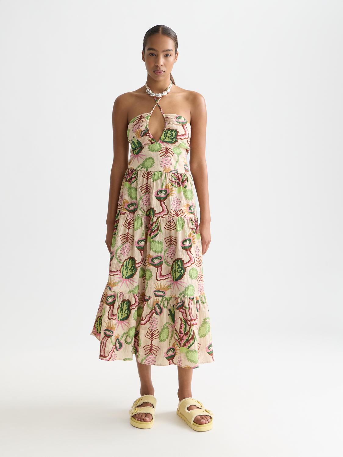 Seersucker midi dress by Scotch & Soda featuring a fitted bodice, flared skirt, and classic striped pattern in soft blue and white.