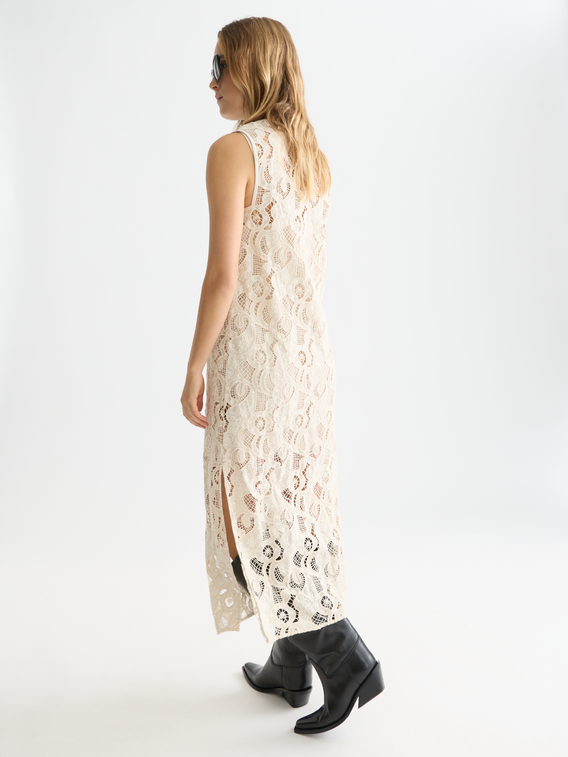 Black embroidered midi dress by Scotch & Soda featuring intricate embroidery and a flowing silhouette.