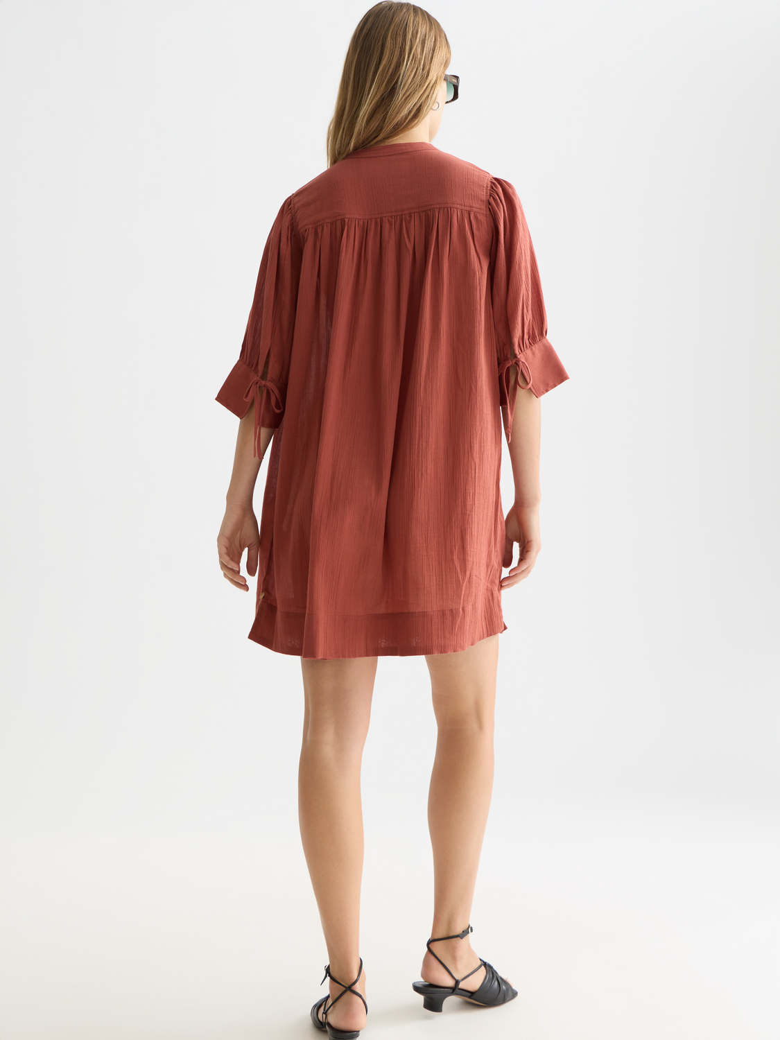 Mini gathered sleeve dress by Scotch & Soda, featuring a stylish design with puffed sleeves and a fitted silhouette.
