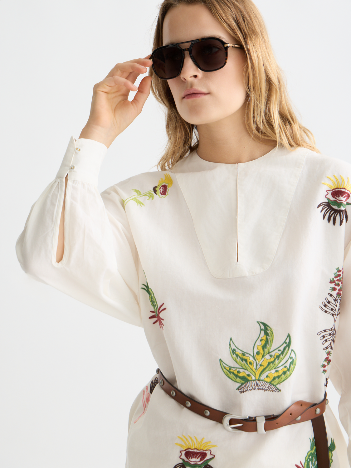 Embroidered mini dress from Scotch & Soda featuring intricate floral embroidery and a stylish, fitted silhouette.