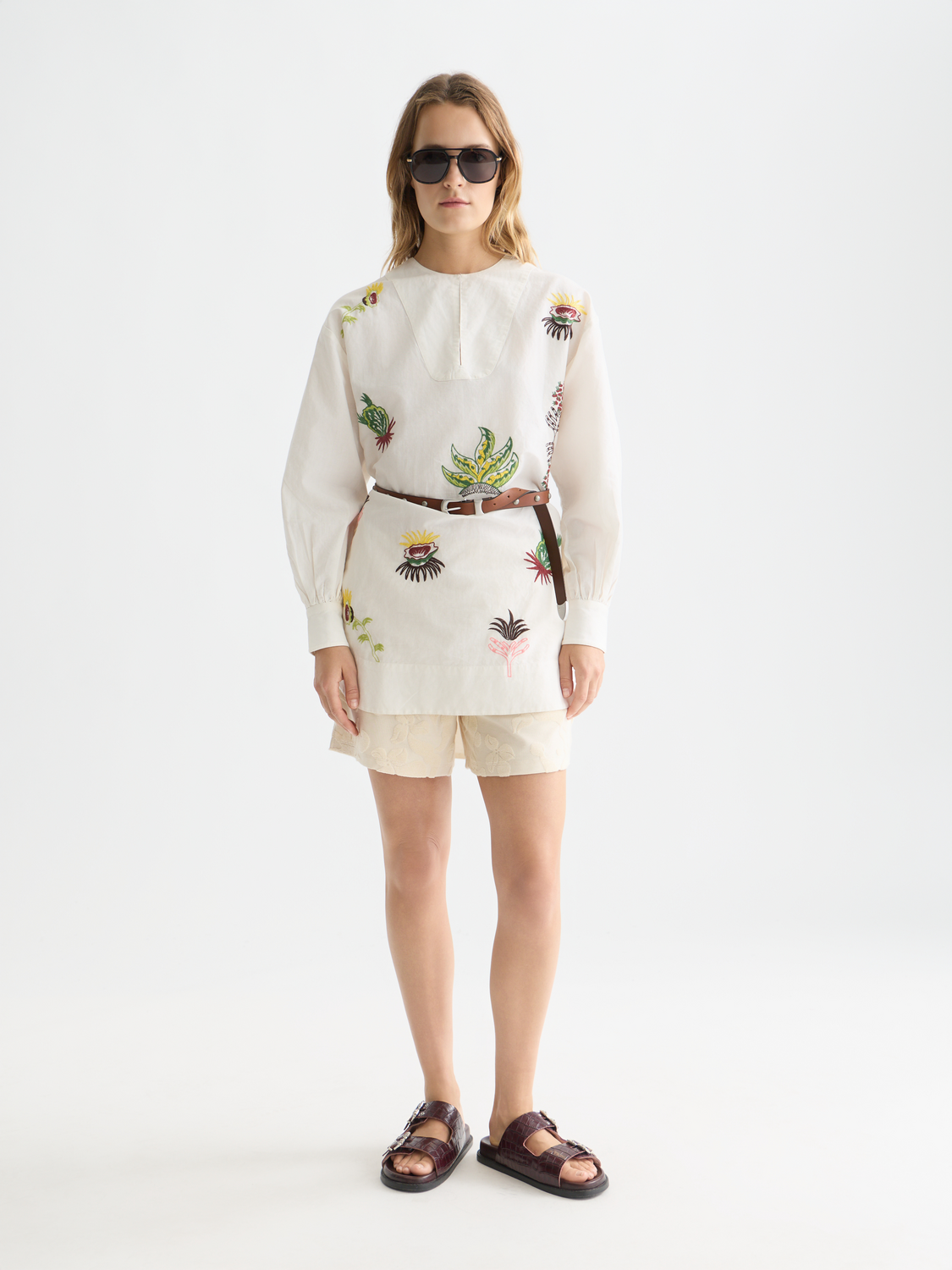 Embroidered mini dress by Scotch & Soda featuring intricate floral embroidery, sleeveless design, and a lightweight fabric.