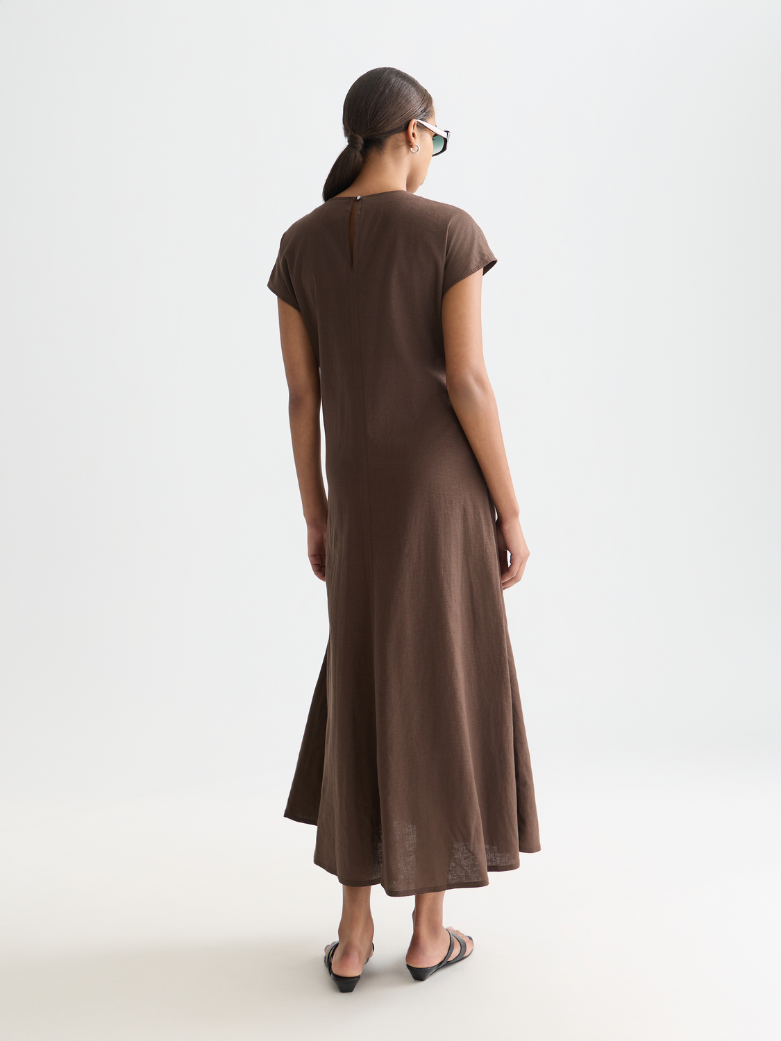 Linen-blend tie dress by Scotch & Soda featuring a relaxed fit, tie waist, and casual style in neutral tones.