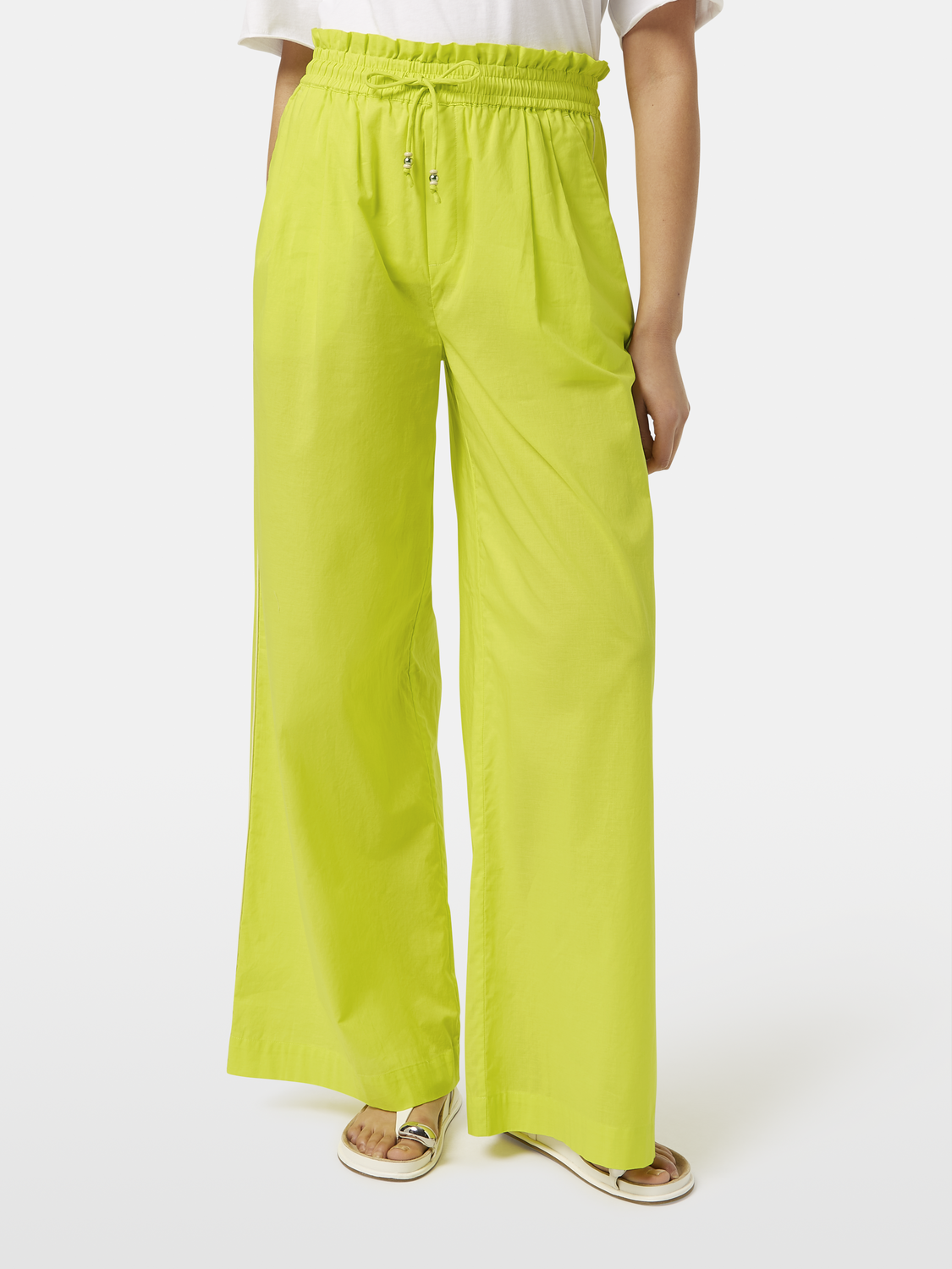 Wide-fit cotton voile pants by Scotch & Soda, showing lightweight, flowy fabric and relaxed fit in natural light.