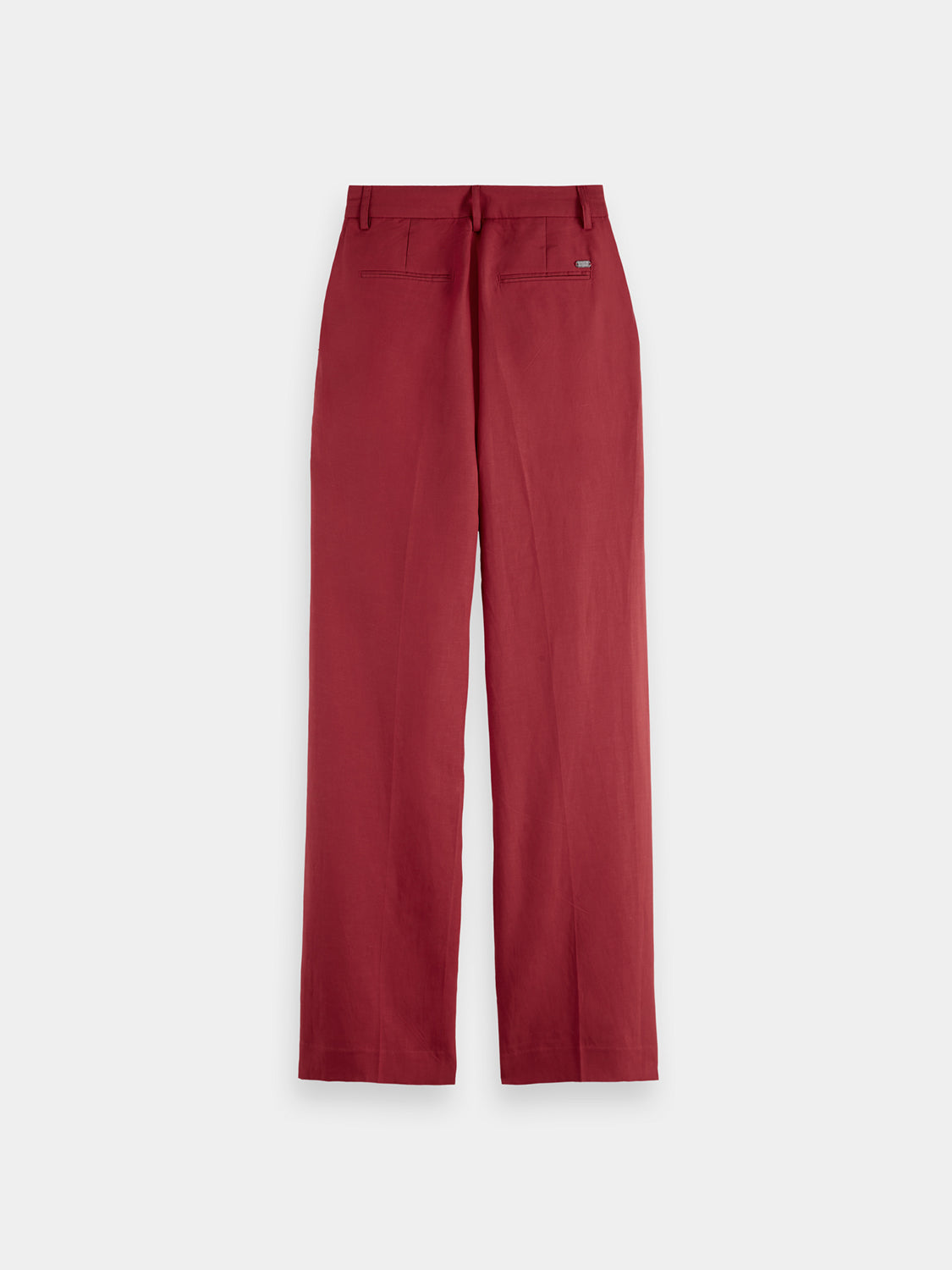 Dark blue Edie wide-fit pants by Scotch & Soda, shown folded with visible waistband and wide-leg design.