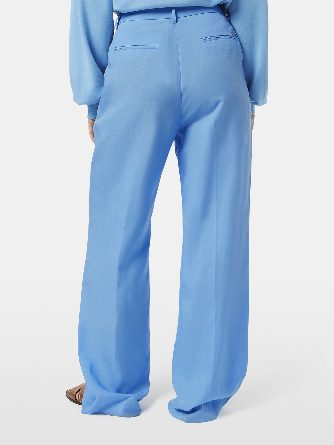 Wide-fit Edie pants by Scotch & Soda, featuring a stylish design and comfortable fit, shown from the back view.