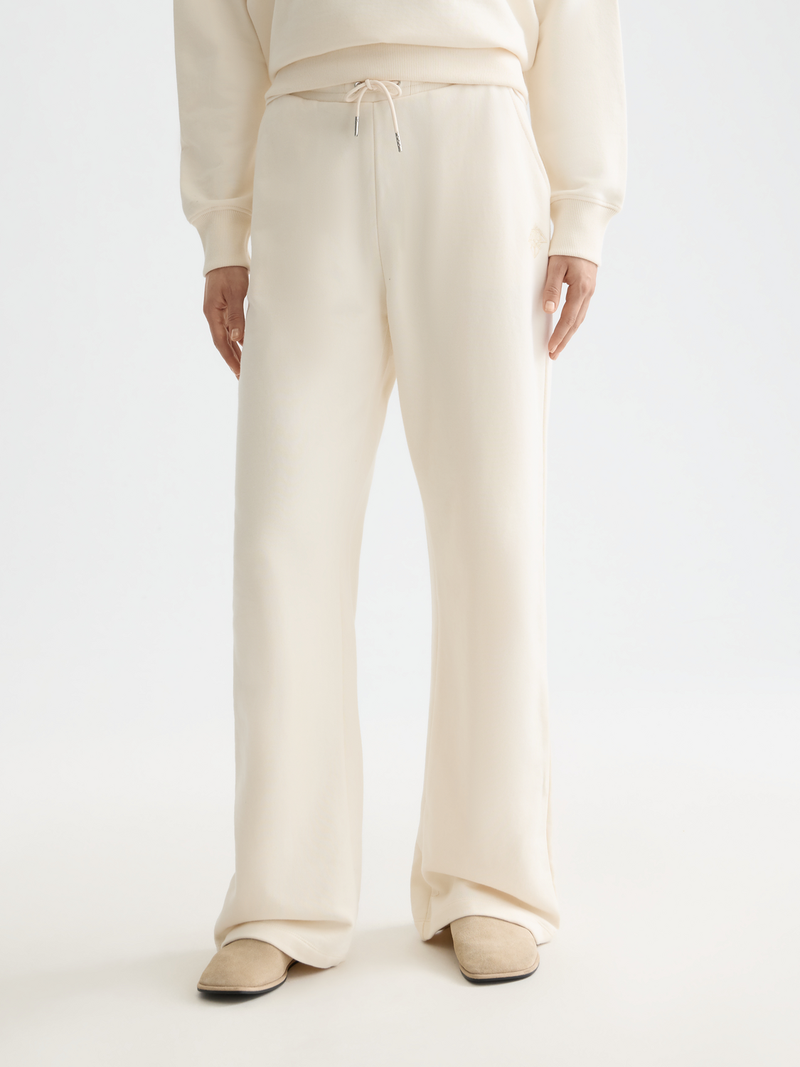 Wide leg SCOTCH & SODA sweatpants with a relaxed fit and soft fabric, shown in a casual, comfortable style.