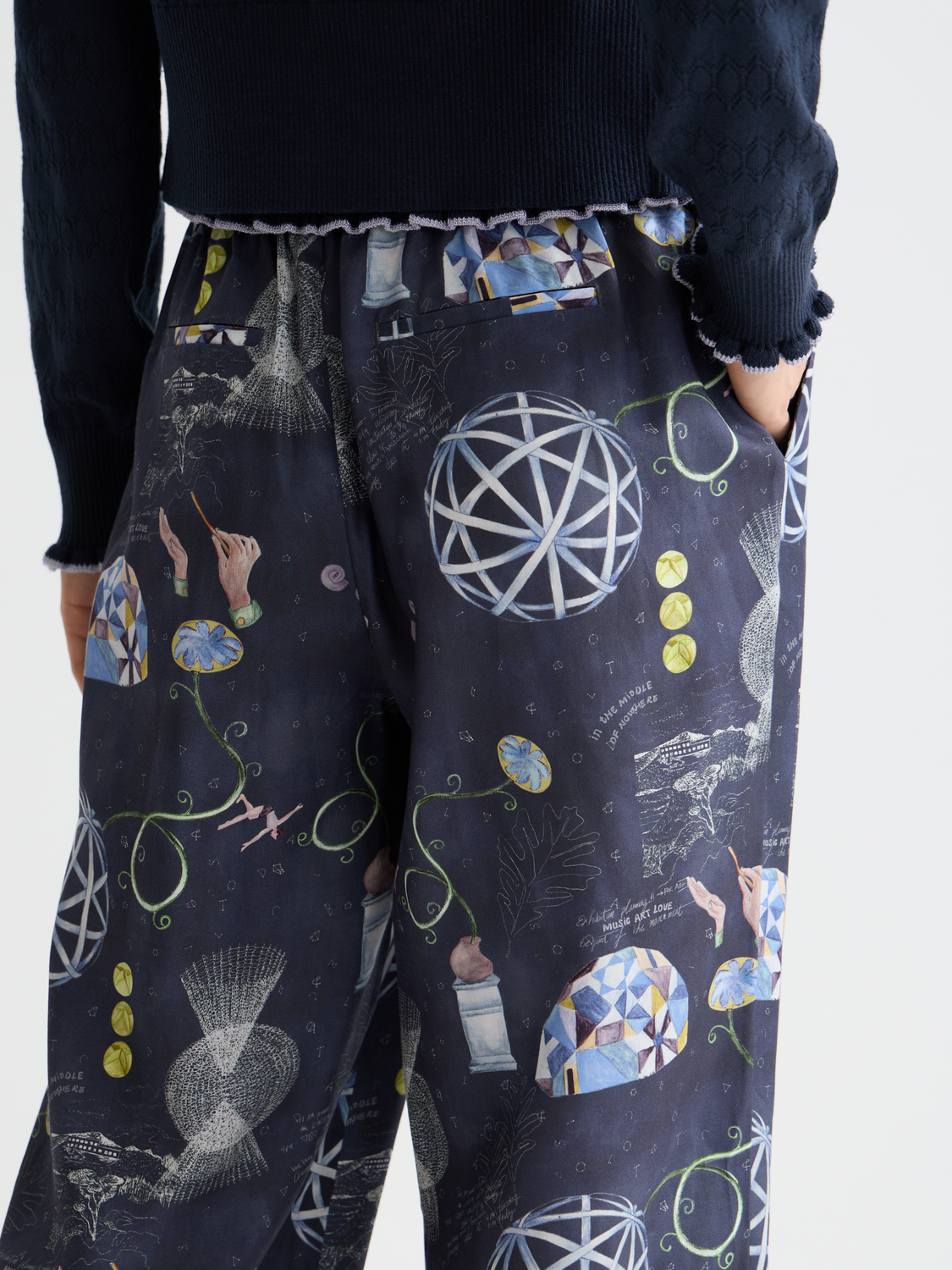 Wide-fit Gia pants by Scotch & Soda, showing a stylish pair of tailored pants with a relaxed fit and neutral color.