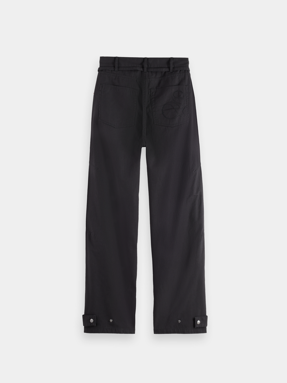 Black Lotus barrel leg pants by Scotch & Soda showing their relaxed fit and stylish design from the back view.