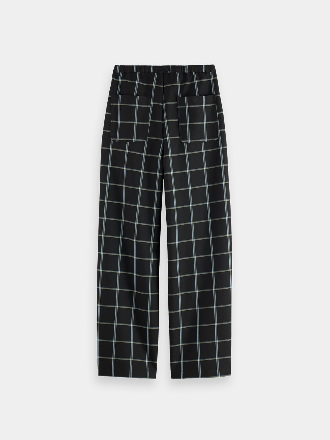 Black Ezra drawstring pants by Scotch & Soda featuring a relaxed fit and casual style, shown on a model.