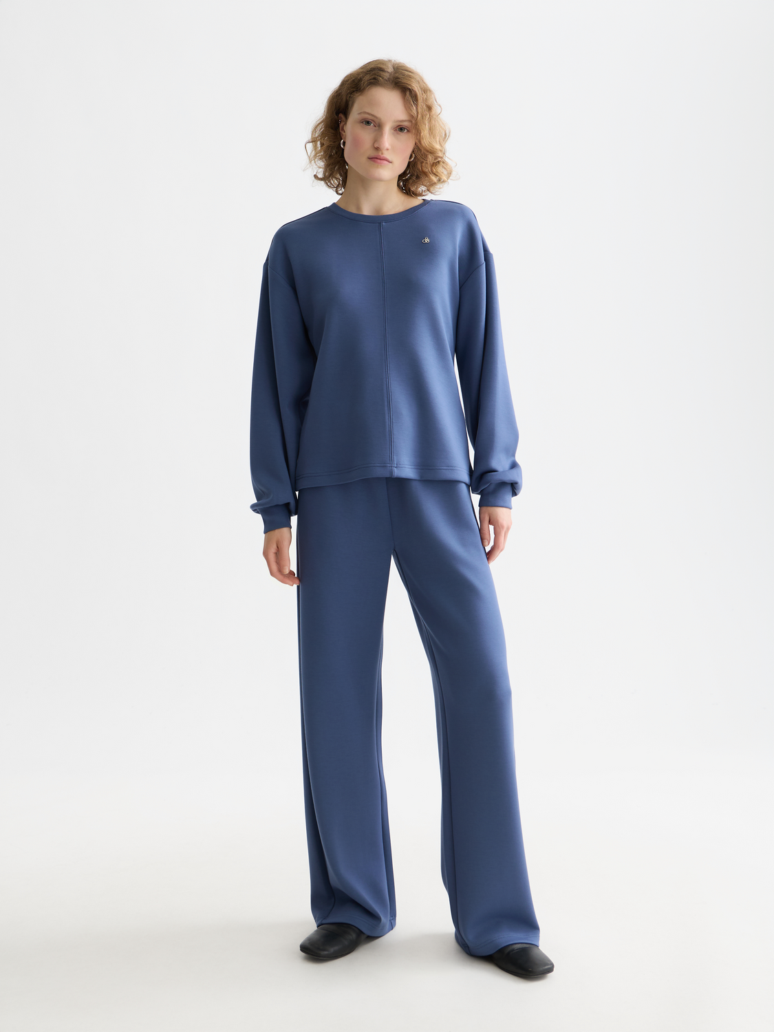Gray modal sweatpants from SCOTCH & SODA with a relaxed fit and soft fabric, shown on a neutral background.