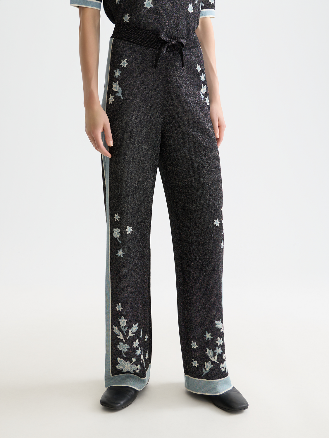 Jacquard knitted sweatpants by Scotch & Soda featuring a textured pattern, relaxed fit, and comfortable design.
