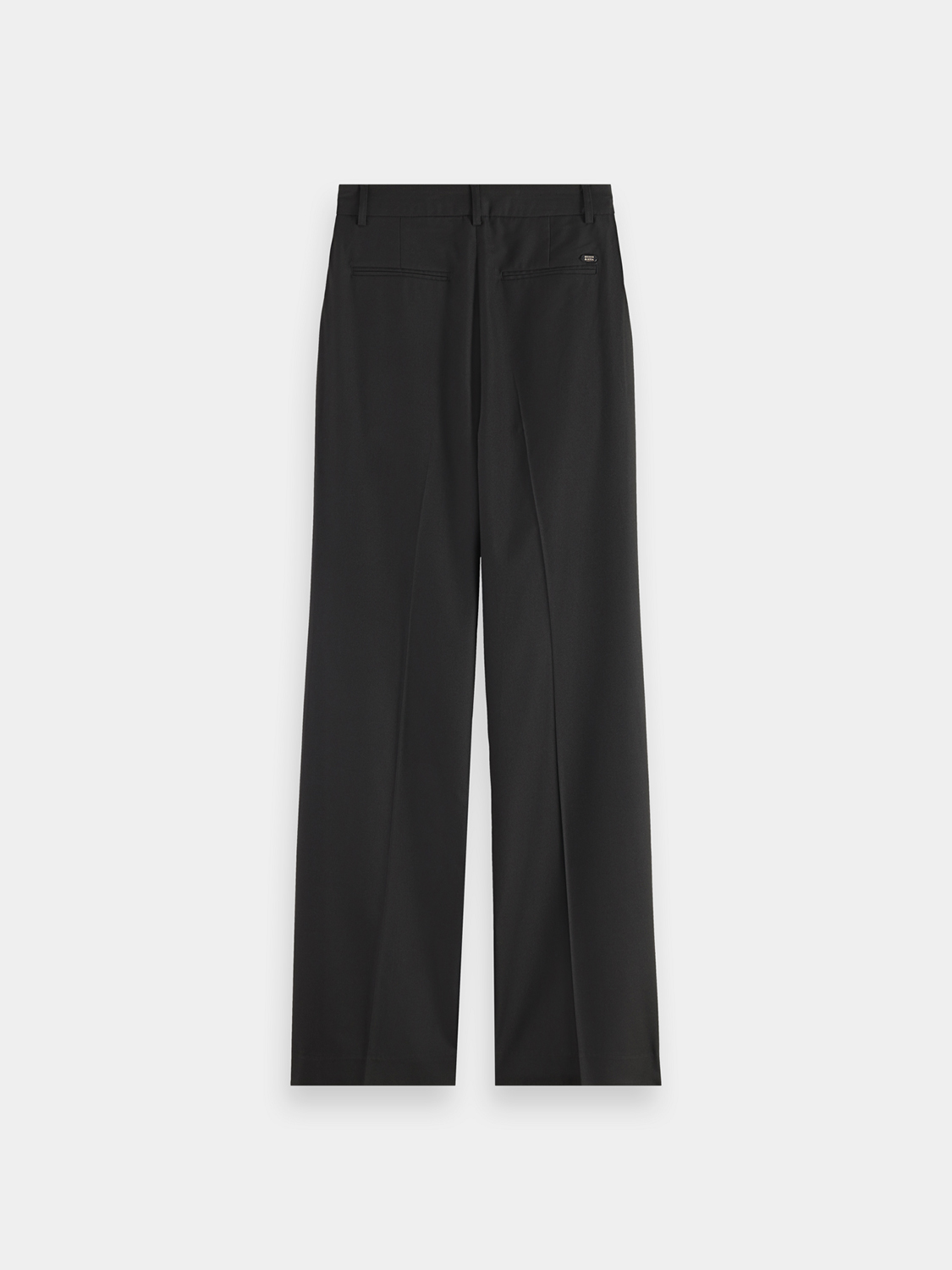 Black Edie wide-fit pants by Scotch & Soda, featuring a relaxed fit and tailored waistband, displayed on a neutral background.