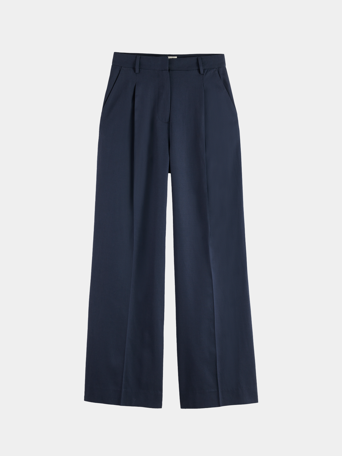 Wide-fit rose-colored pants by Scotch & Soda, featuring a relaxed style and tailored fit, shown on a model.