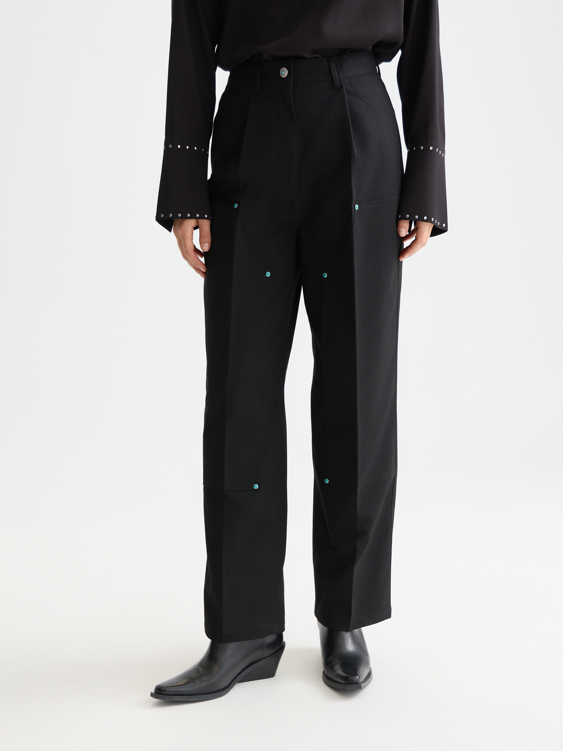 Raine wide-fit pants by Scotch & Soda, featuring a relaxed fit and stylish design, shown in a front view.