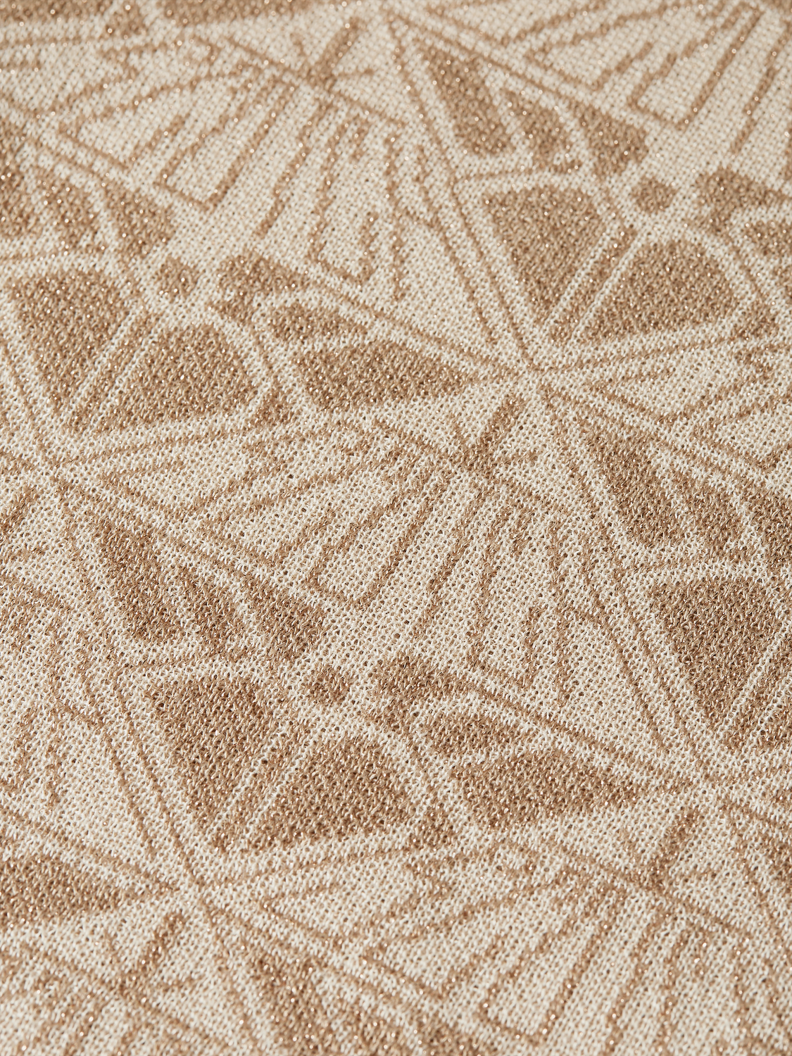 Jacquard knitted sweatpants by Scotch & Soda with a relaxed fit and intricate woven pattern, shown in a neutral color.