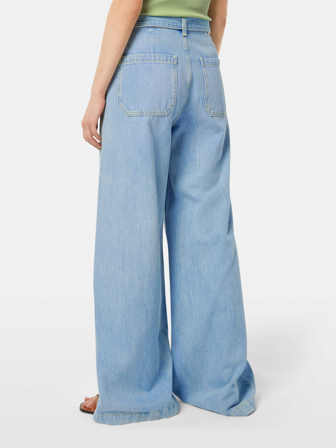 Wide-fit denim jeans from Scotch & Soda featuring a classic wave design, back view showing stitching and relaxed fit.