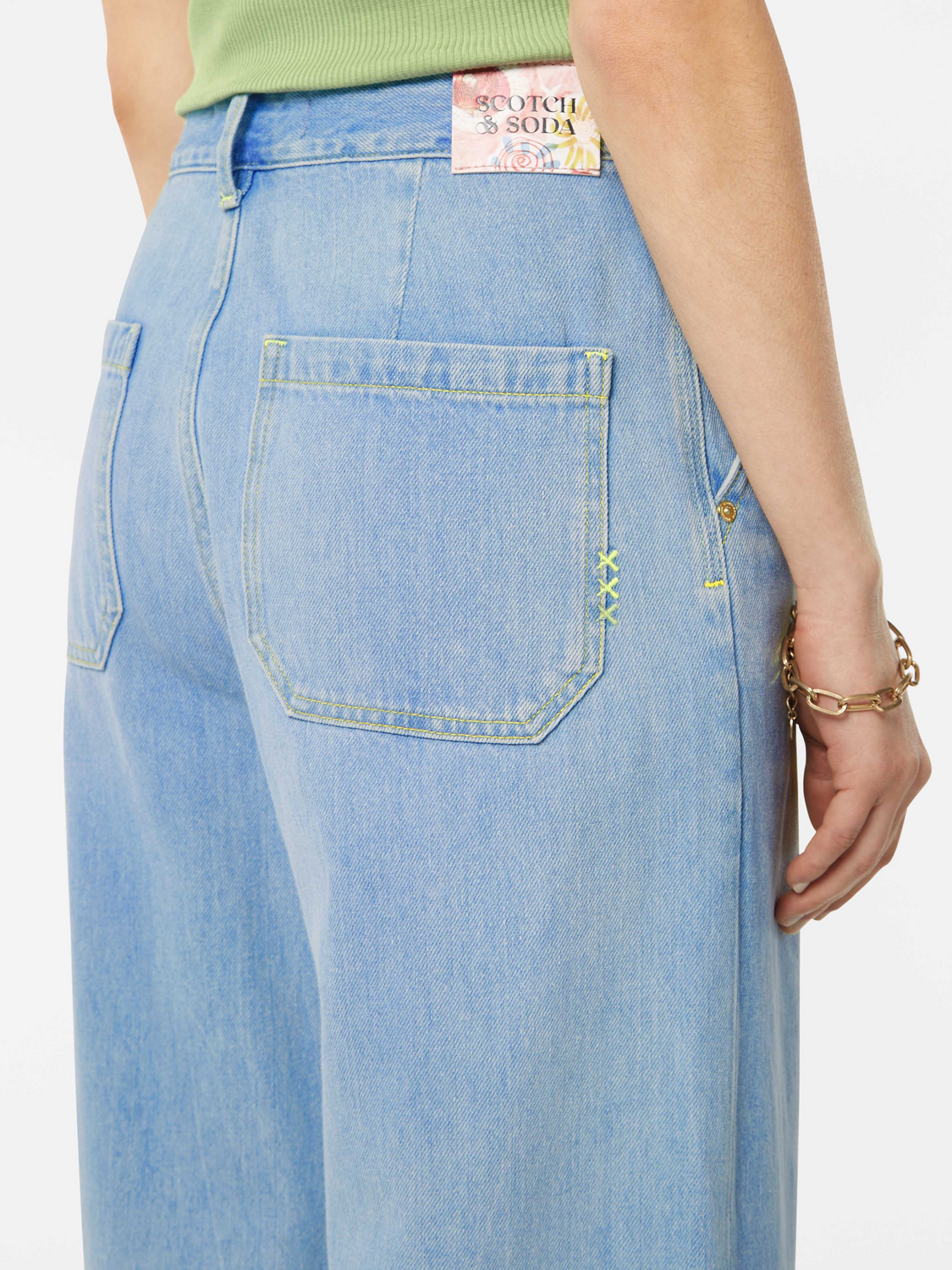 Wave wide-fit denim jeans by Scotch & Soda, featuring a relaxed fit, classic five-pocket design, and stylish distressed detailing.